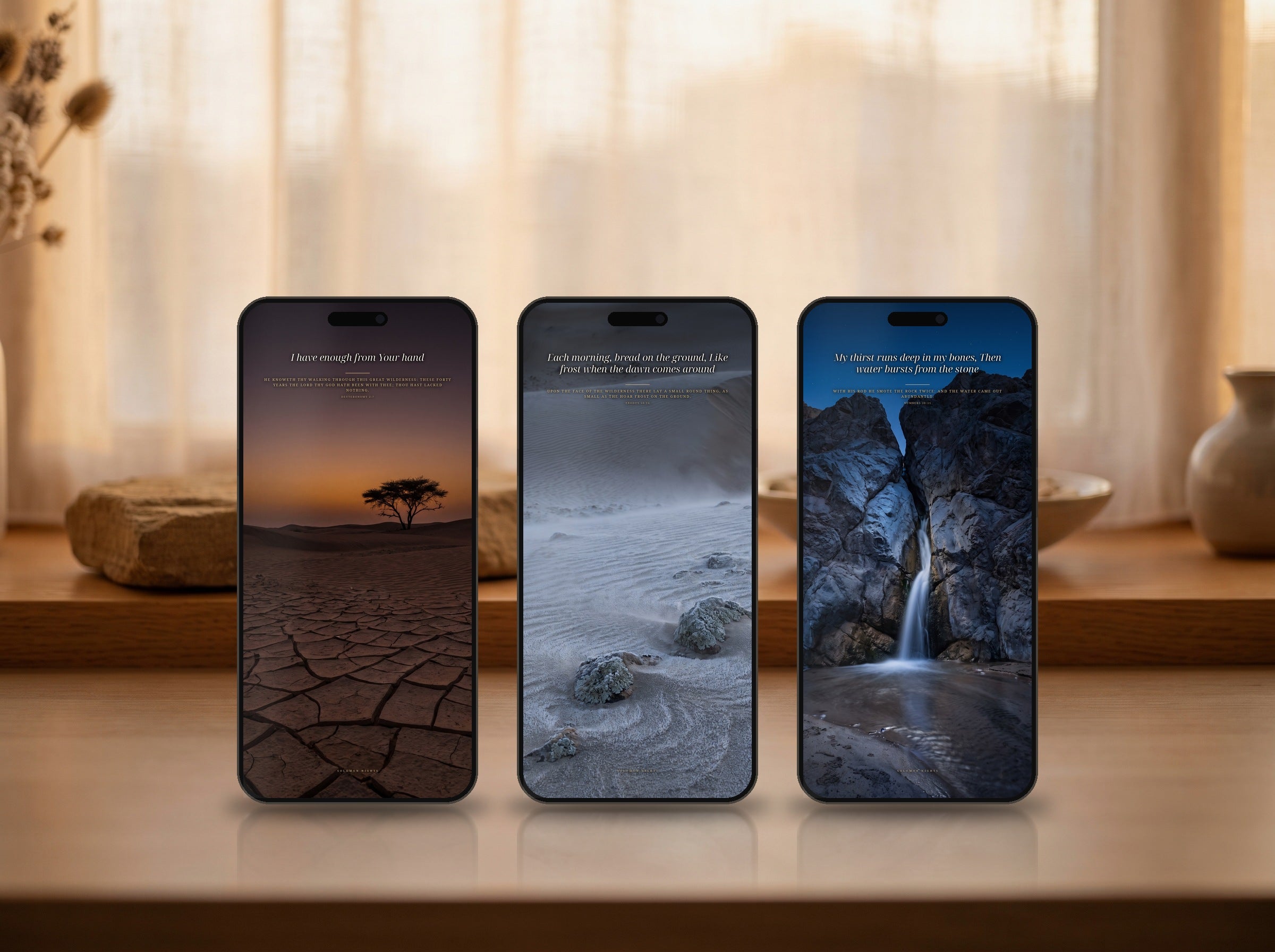 All three phone wallpapers from this set shown on three phones