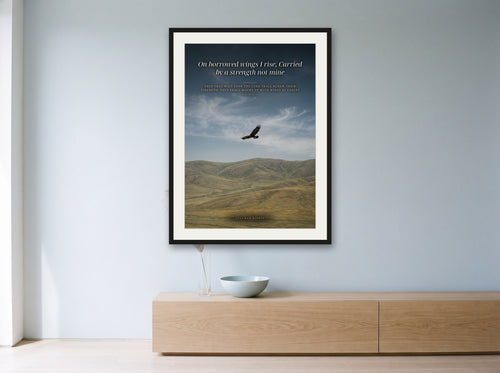 On Borrowed Wings print framed on a wall
